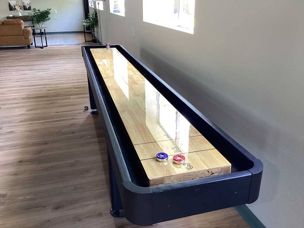 A shuffleboard table in the rec room at Vinton RV Park