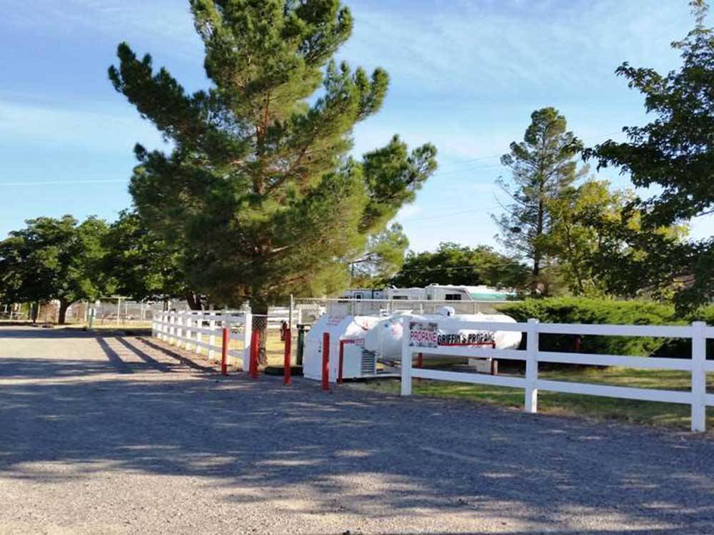 The white fence by the propane filling station at ROADRUNNER RV PARK OF DEMING