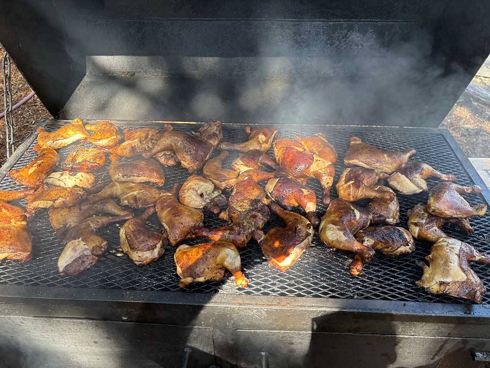 Chicken on a barbeque grill at Port Orford RV Village