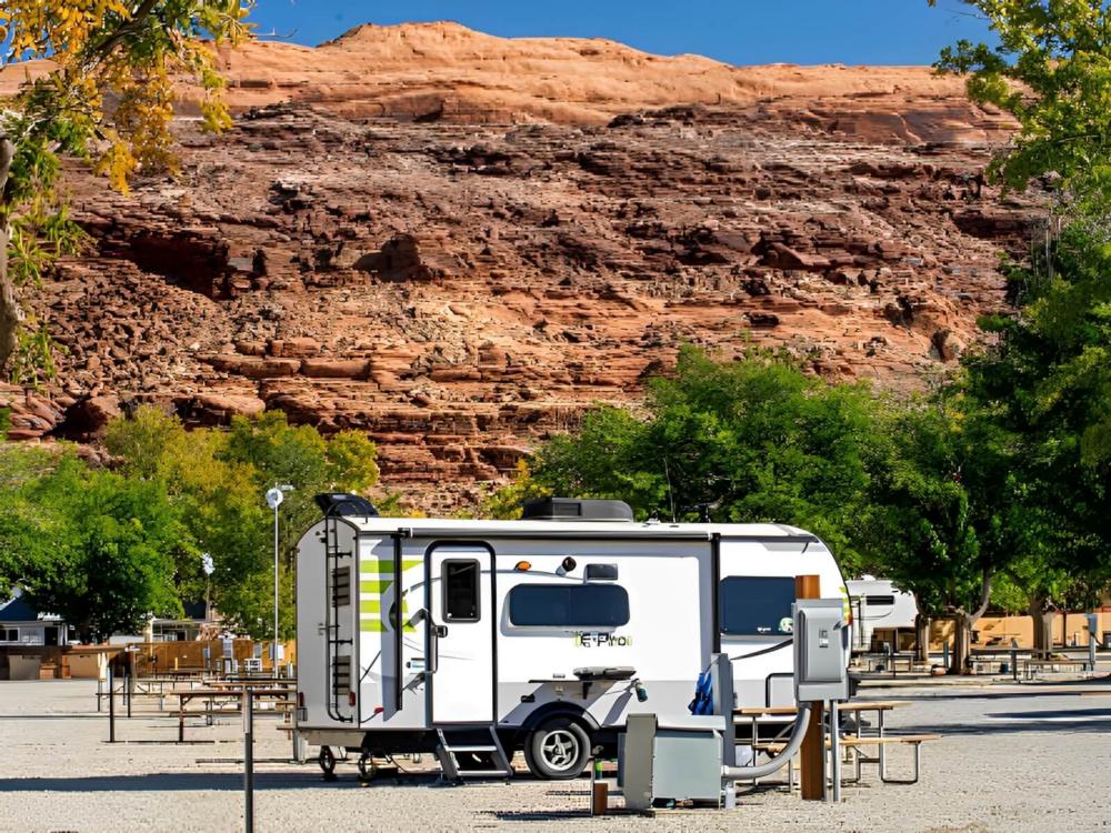 Parked trailer at site Sun Outdoors North Moab