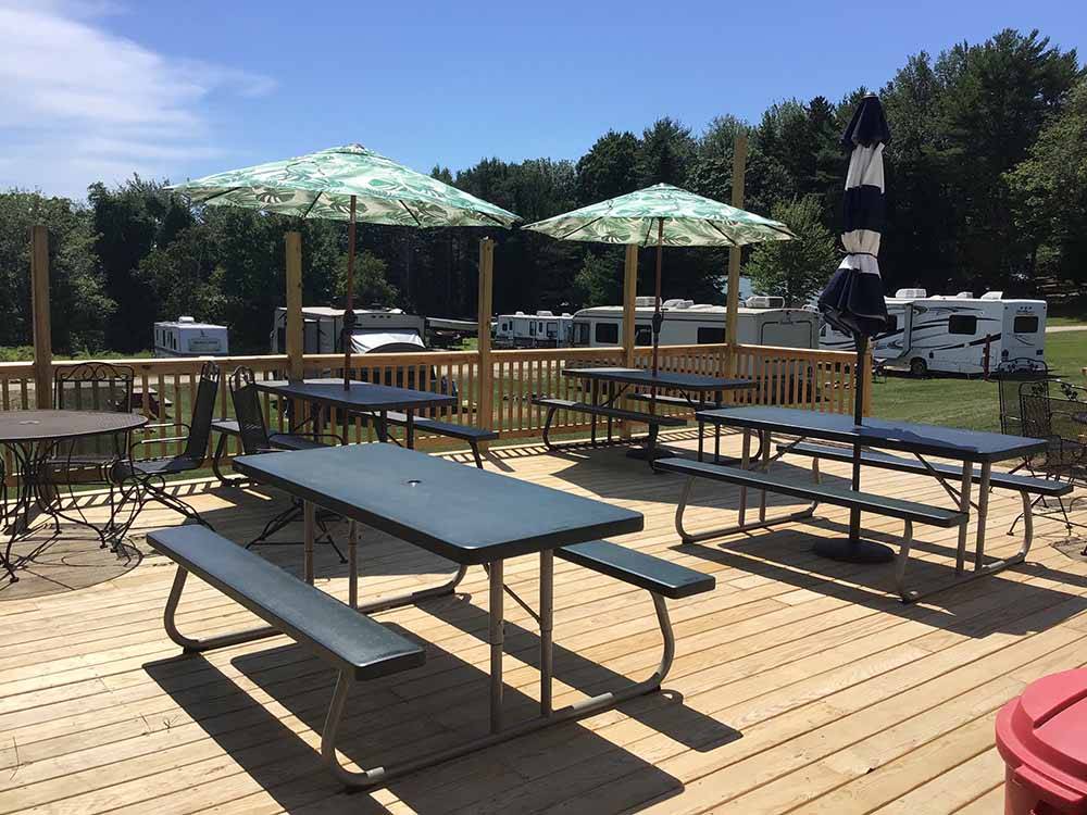 The picnic tables on the deck at MEADOWBROOK CAMPING AREA