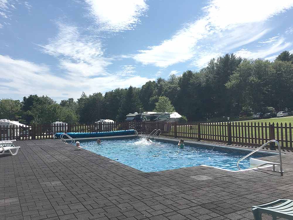 People playing in the pool at MEADOWBROOK CAMPING AREA