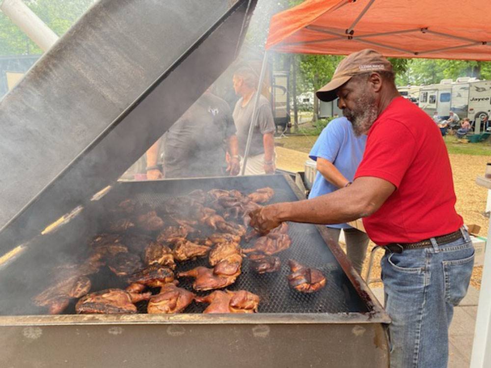 Grilling chicken at Americamps RV Resort