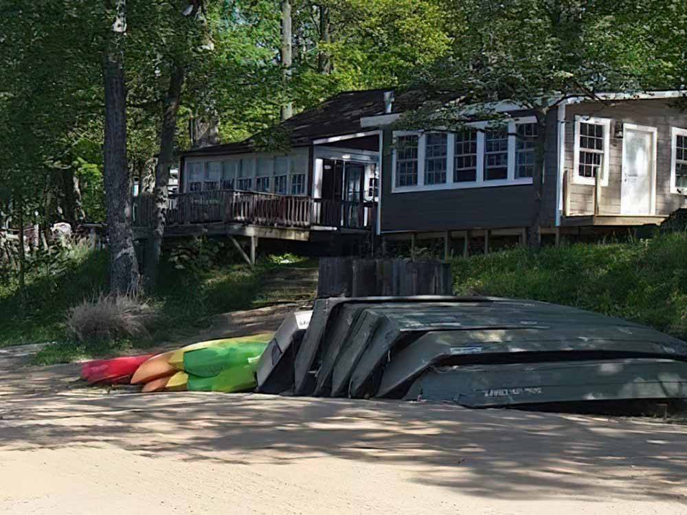 A stack of boats and kayaks at FULLER'S RESORT & CAMPGROUND ON CLEAR LAKE