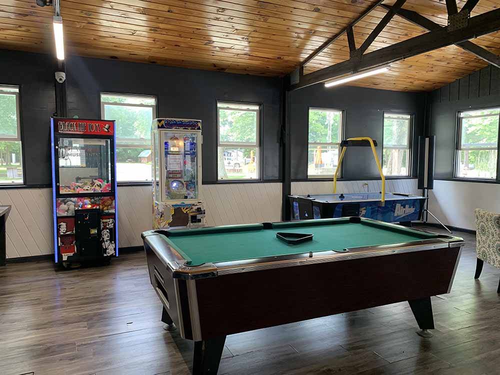 Table games and arcade games in the rec room at TERRE HAUTE CAMPGROUND