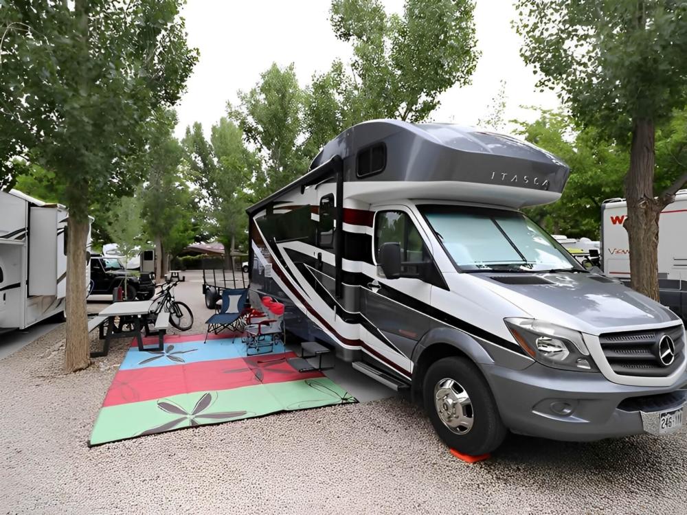RV parked at site Sun Outdoors Moab Downtown