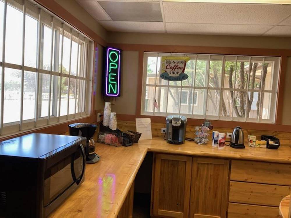 Coffee bar and microwave area at LARAMIE RV RESORT BY RJOURNEY