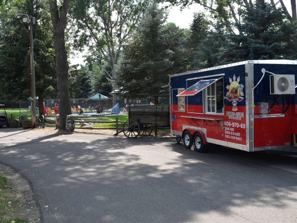 A food truck at the park at YELLOWSTONE RIVER RV PARK & CAMPGROUND