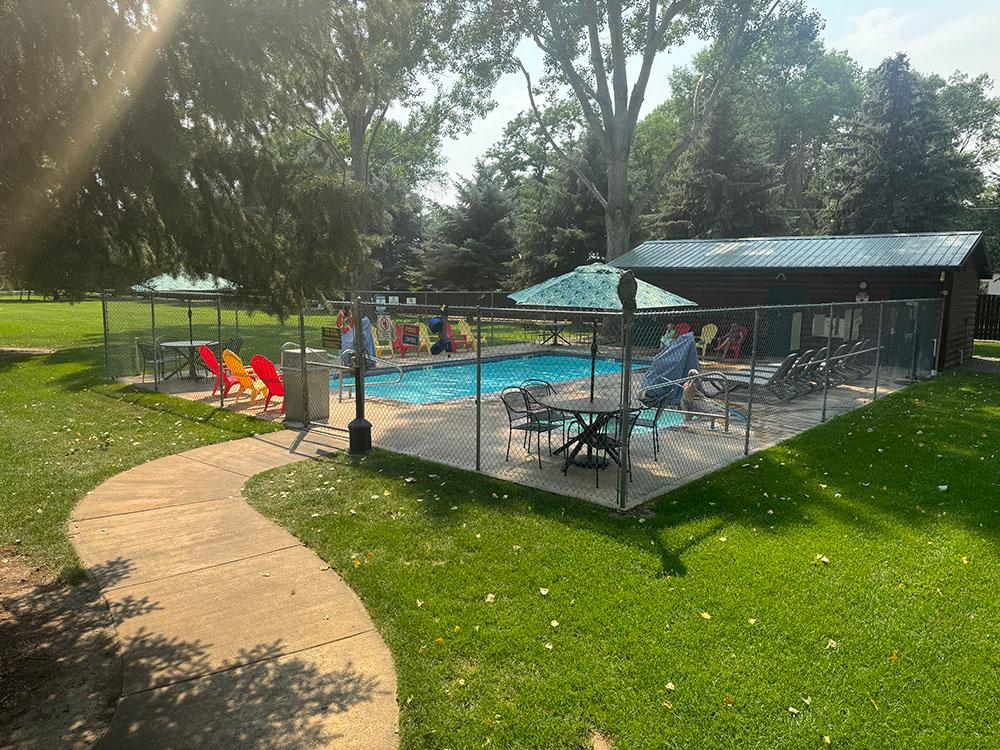 The enclosed pool area at YELLOWSTONE RIVER RV PARK & CAMPGROUND