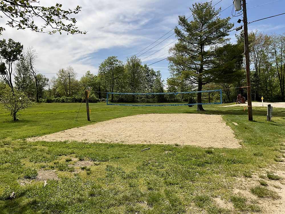The sand volleyball court at SUNSETVIEW FARM CAMPING AREA
