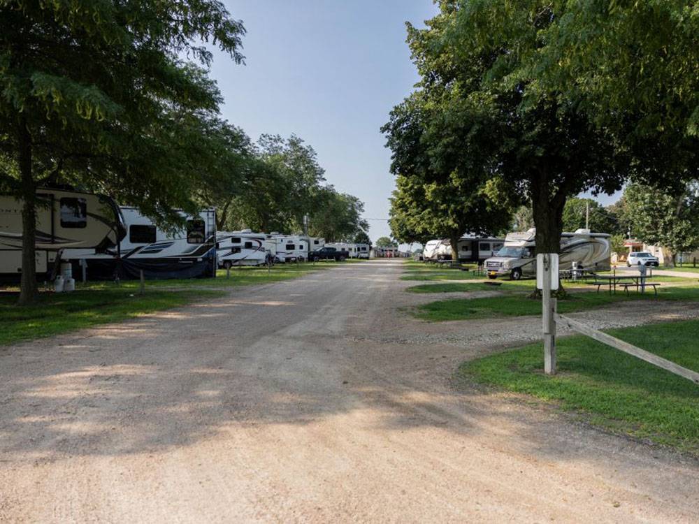A gravel road leading to RV sites