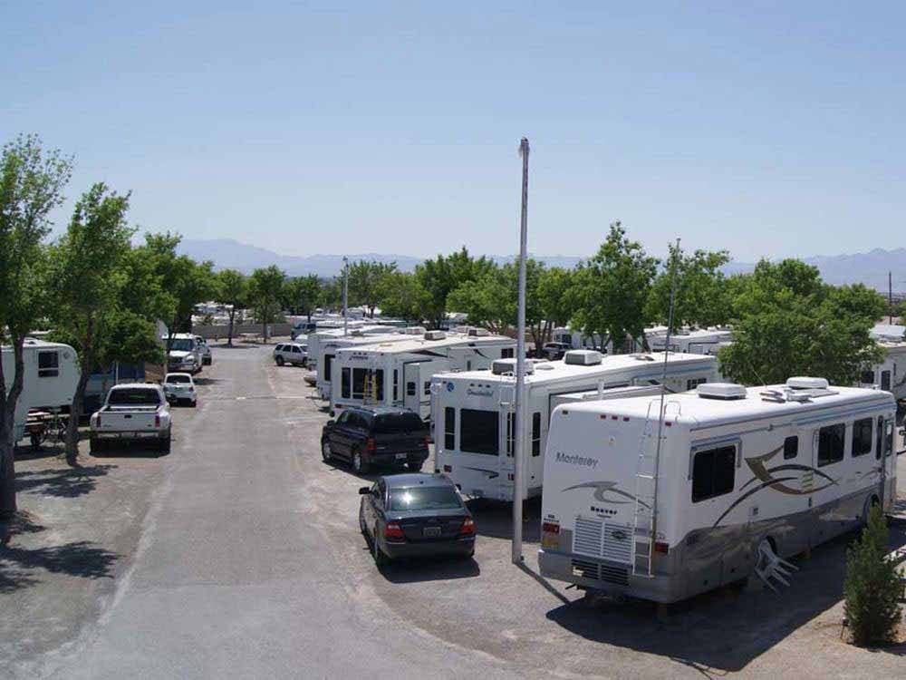 An aerial view of a row of RVs at HITCHIN' POST RV PARK