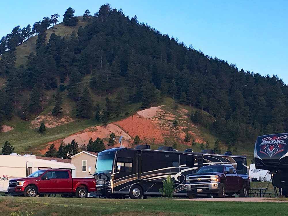 RVs and fifth wheels parked in sites at MOUNTAIN VIEW RV PARK & CAMPGROUND