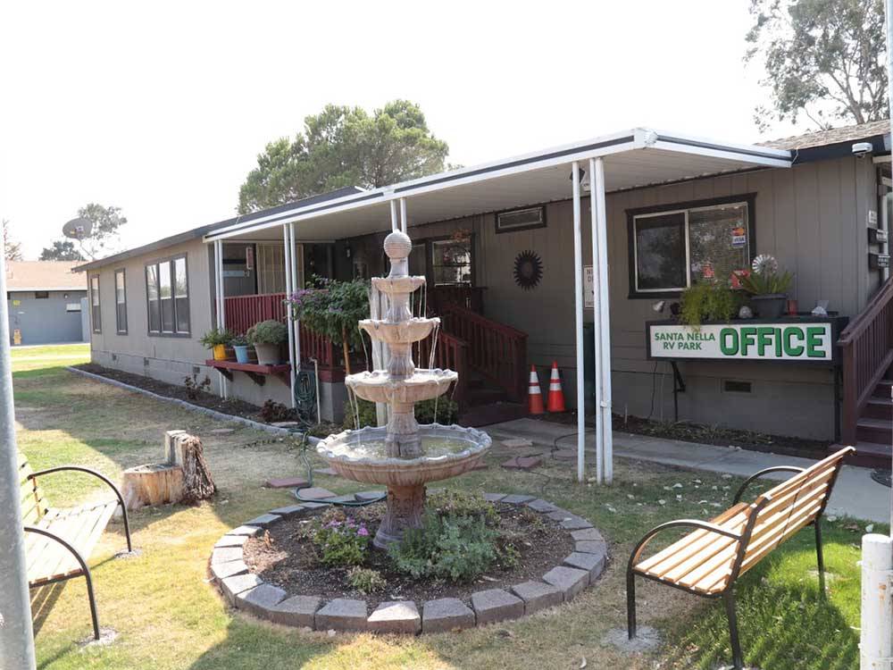 The front office with a fountain at SANTA NELLA RV PARK