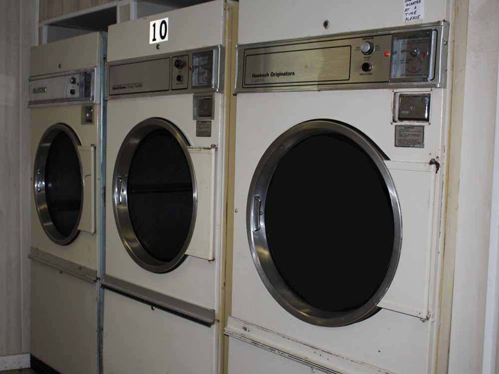 A line of laundry dryers at NASHVILLE I-24 CAMPGROUND