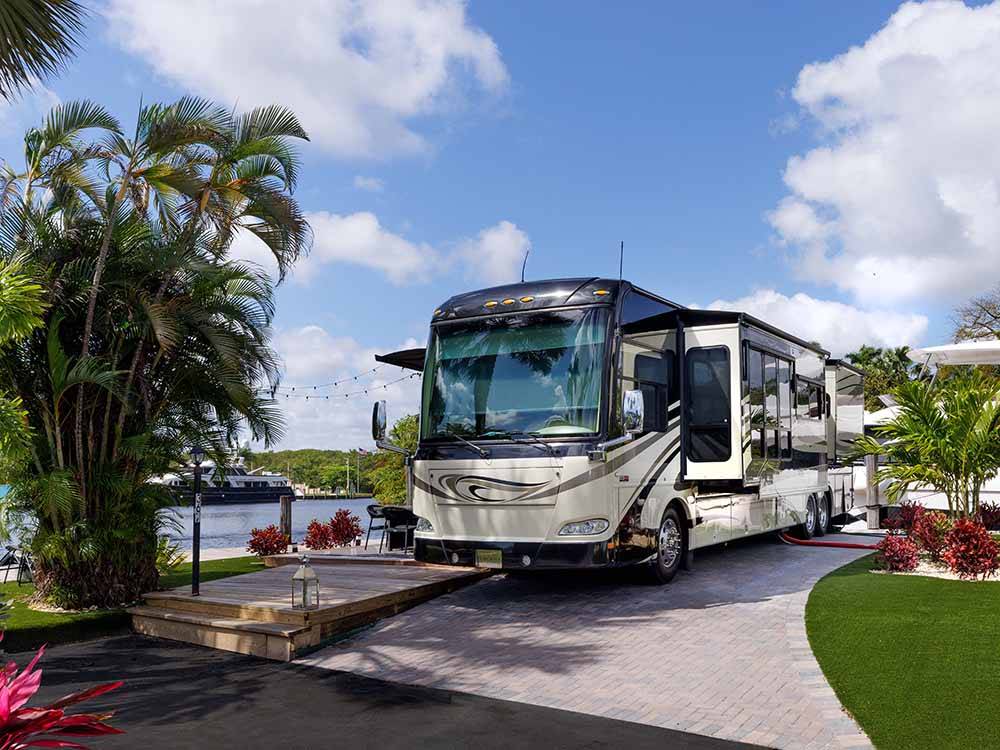 A luxury motorhome in a paved RV site at YACHT HAVEN PARK & MARINA