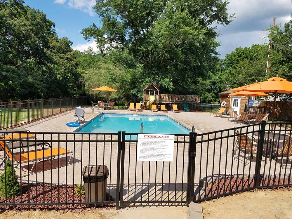 The fenced in pool area at RACCOON MOUNTAIN CAMPGROUND AND CAVERNS