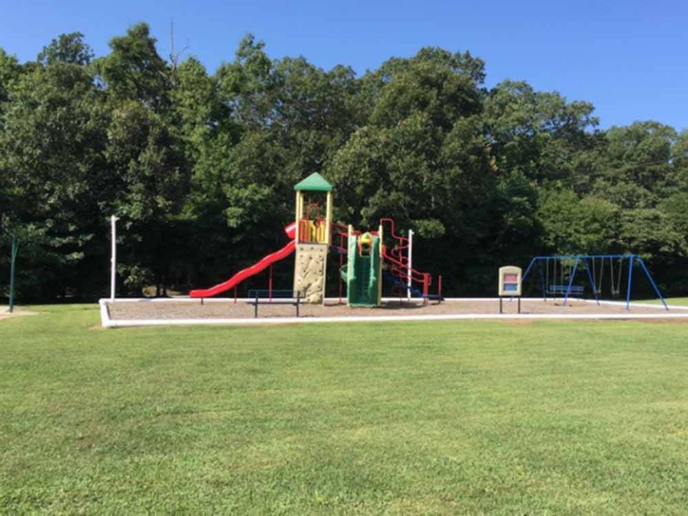 The playground area with a red slide at KING NUMMY TRAIL CAMPGROUND