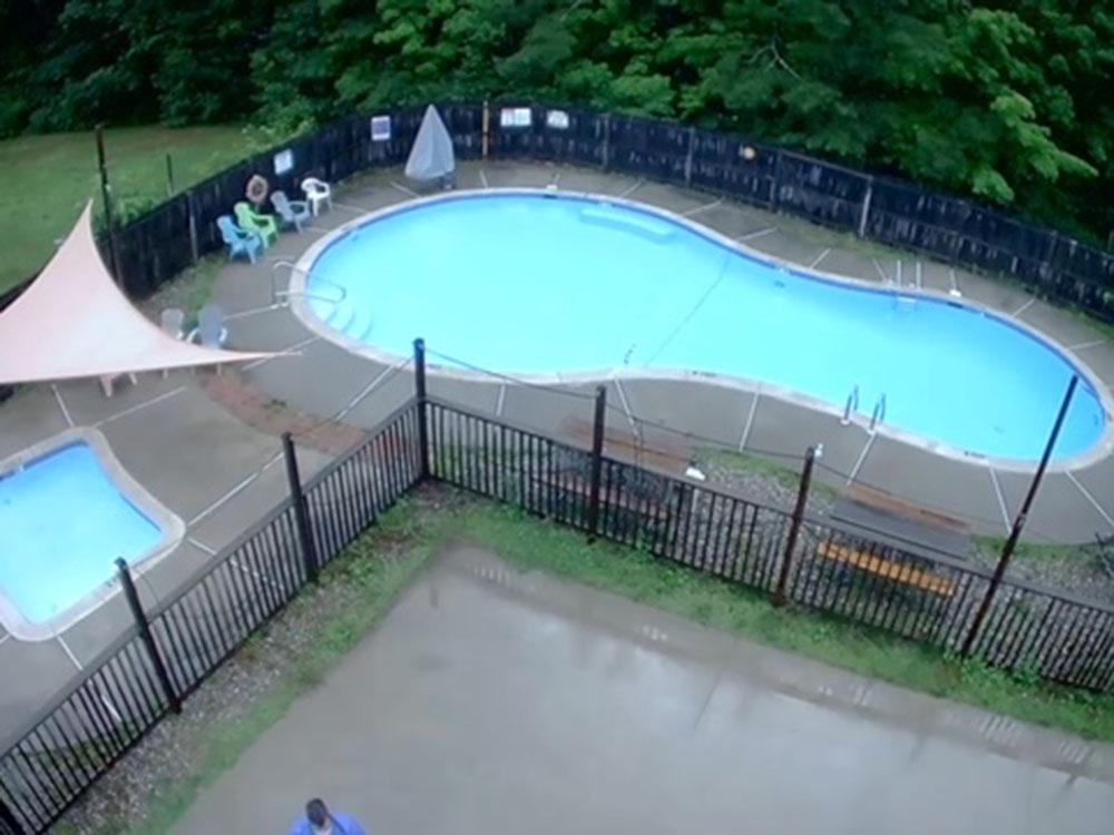 Aerial view of the swimming pool and hot tub at CROW'S NEST CAMPGROUND