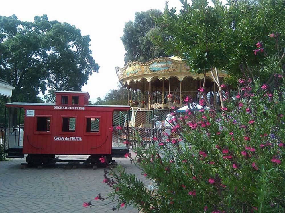 Train and merry go round at CASA DE FRUTA RV PARK