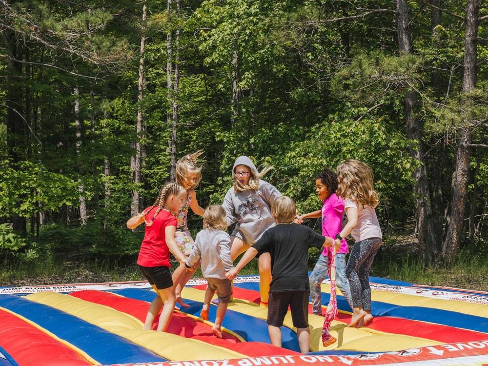 Kids jumping on the bounce pillow