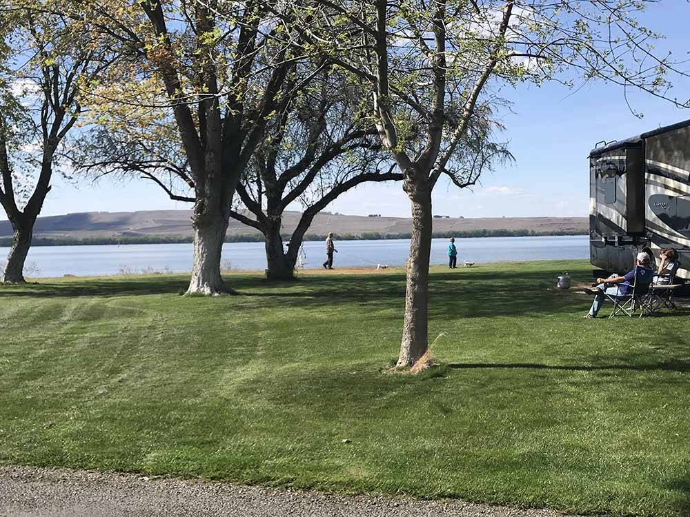 More grassy area with a view of the water at BOARDMAN MARINA & RV PARK