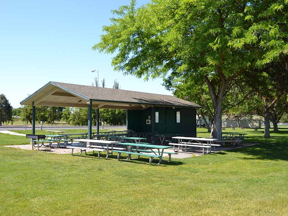 An outdoor pavilion with picnic tables at BOARDMAN MARINA & RV PARK