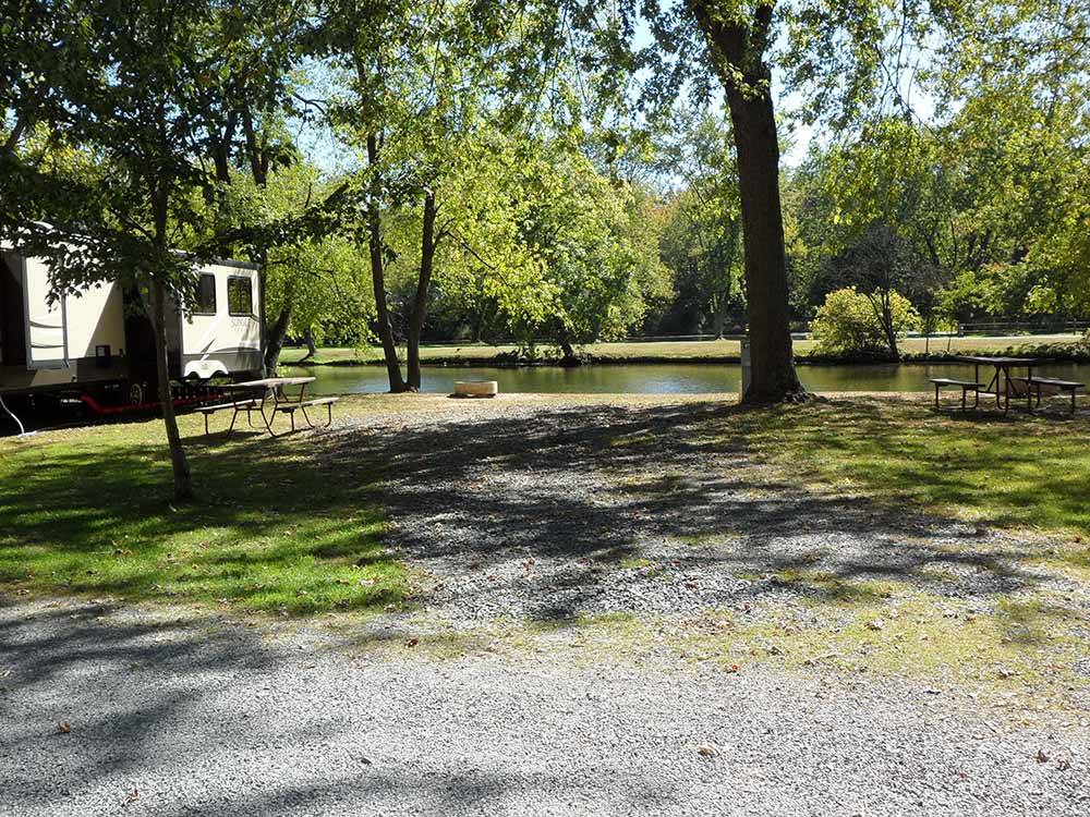 Fifth wheel by the lakefront site at FRIENDSHIP VILLAGE CAMPGROUND & RV PARK