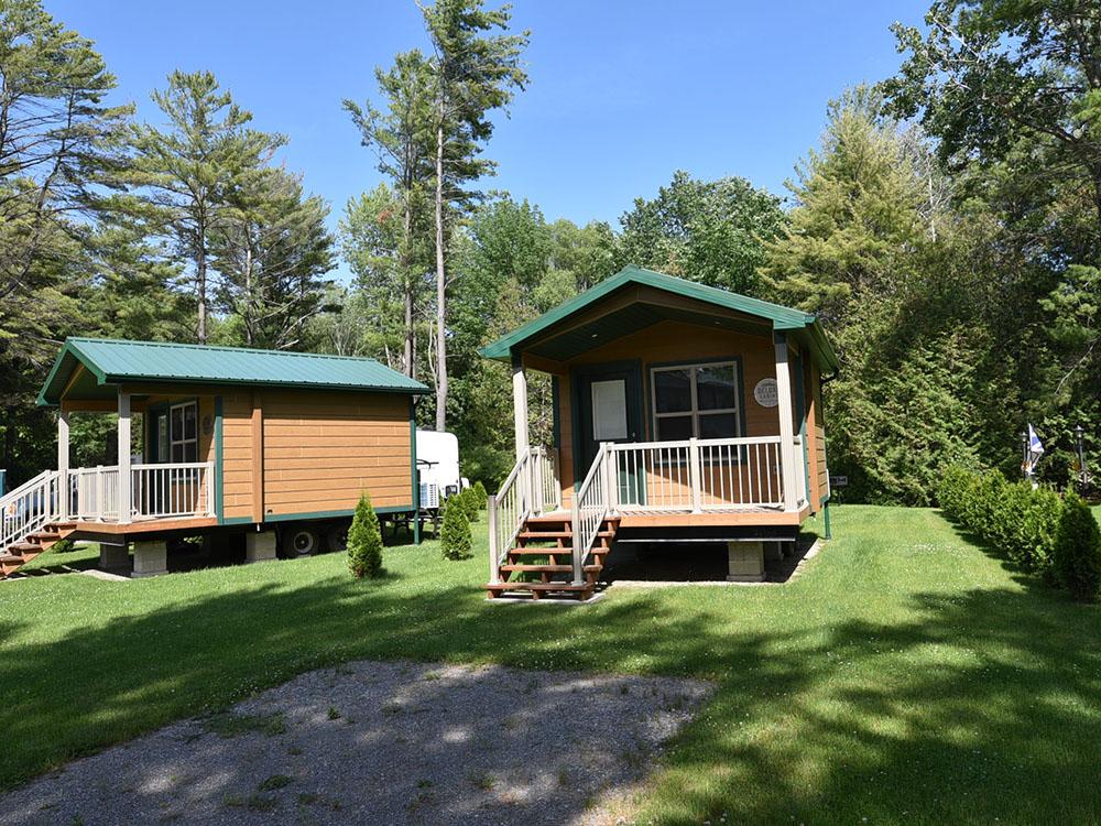 Two of the rental cabins at COBOURG EAST CAMPGROUND