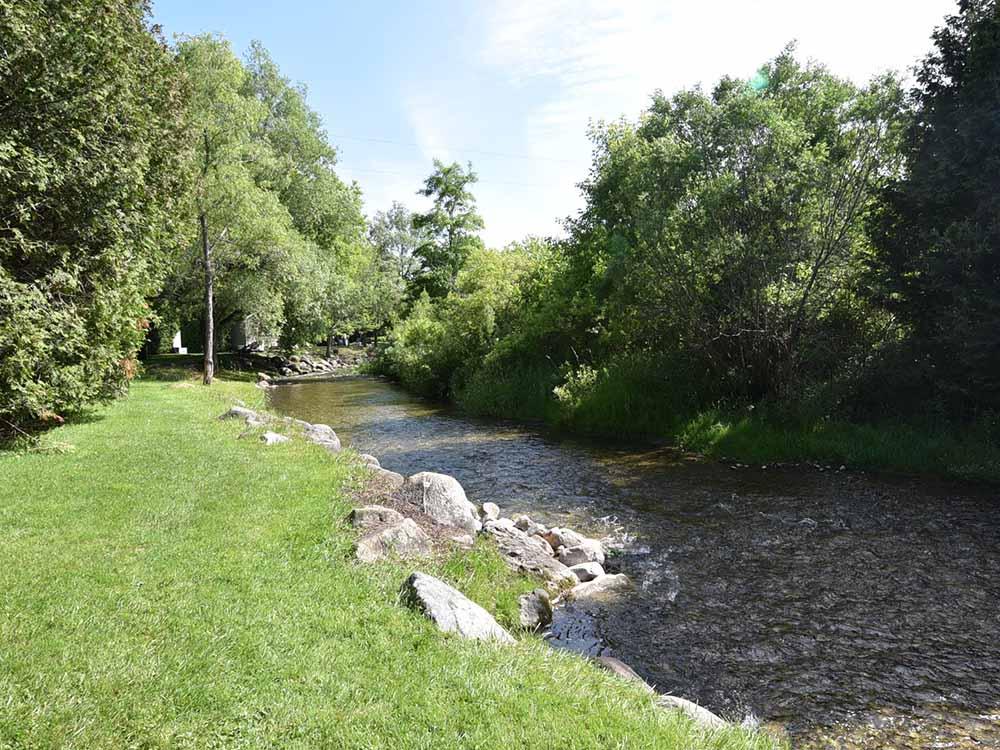 A view of the creek near the sites at COBOURG EAST CAMPGROUND