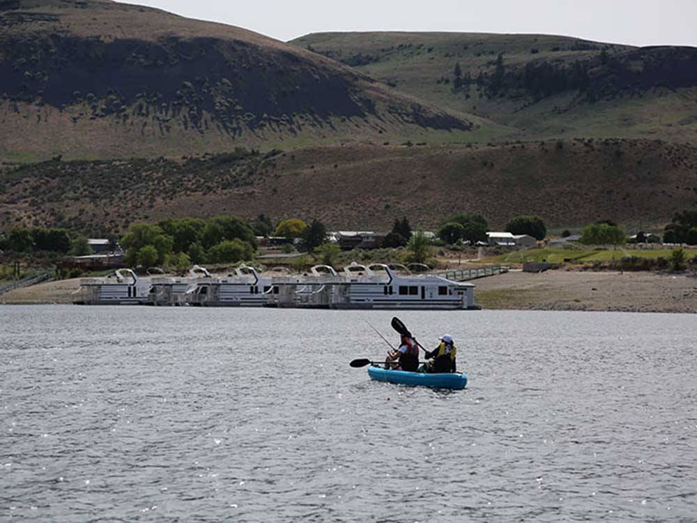 A couple in a kayak fishing at LAKE ROOSEVELT NRA/KELLER FERRY CAMPGROUND
