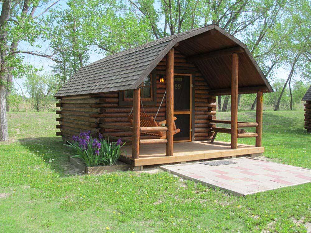 One of the wooden cabins at BADLANDS / WHITE RIVER KOA HOLIDAY