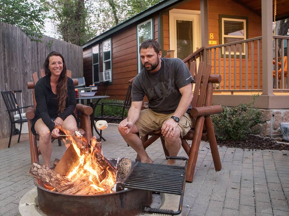 People roasting marshmallows