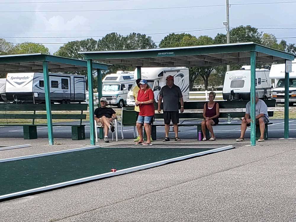 People playing bocce ball at CYPRESS CAMPGROUND & RV PARK