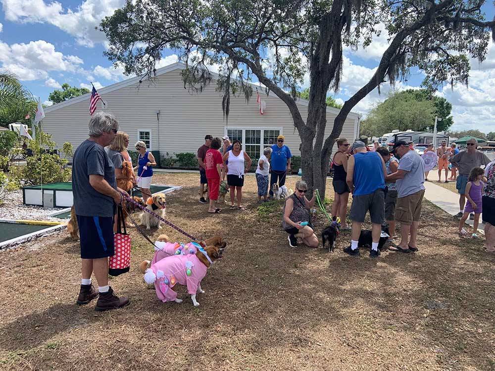 A group of people with their dogs at CYPRESS CAMPGROUND & RV PARK