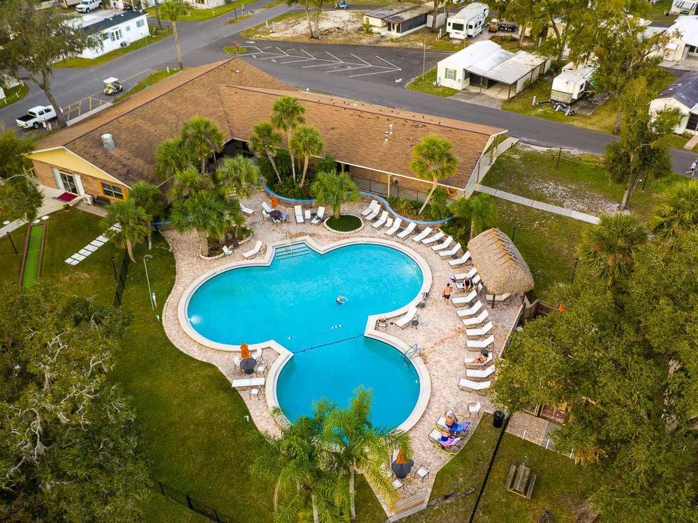 Aerial shot of clover-shaped pool  at HOLIDAY RV VILLAGE