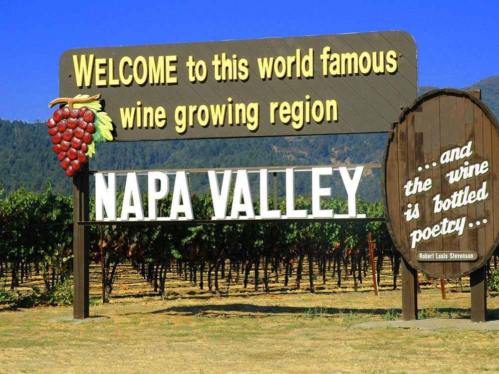 A large wooden sign for Napa Valley nearby at TRADEWINDS RV PARK OF VALLEJO