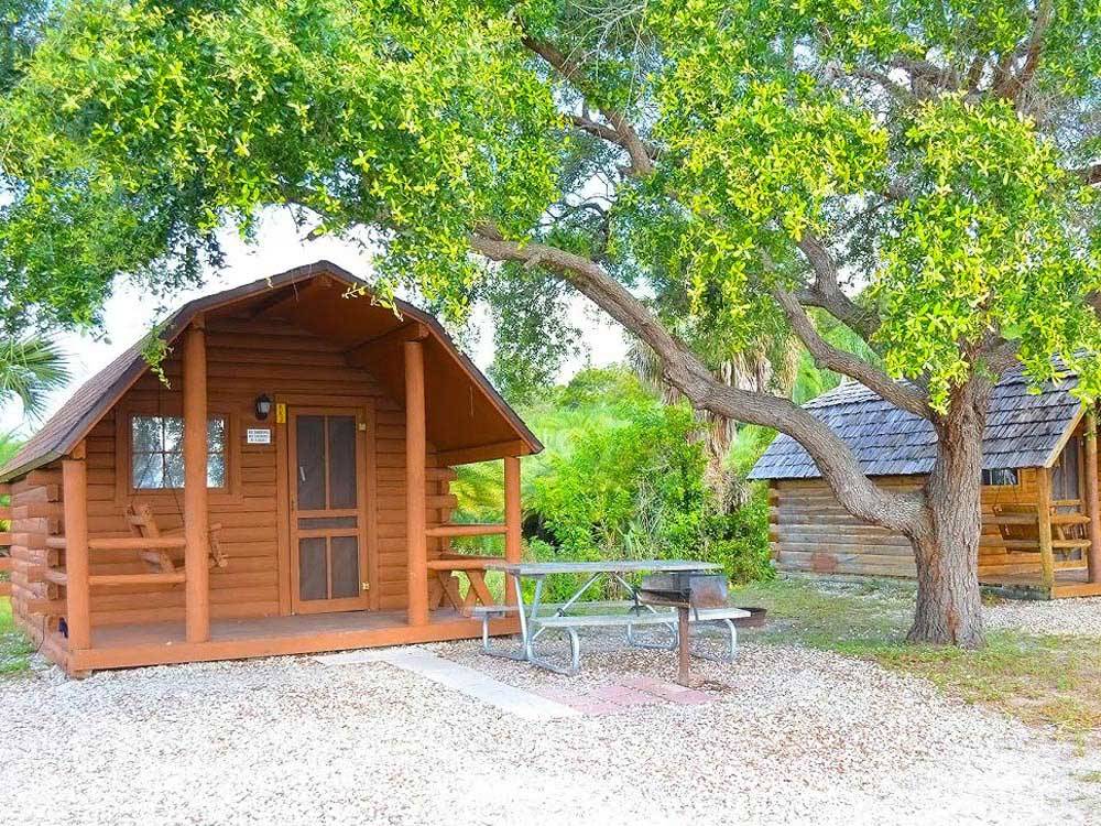Log cabins with decks at FORT MYERS/PINE ISLAND KOA HOLIDAY