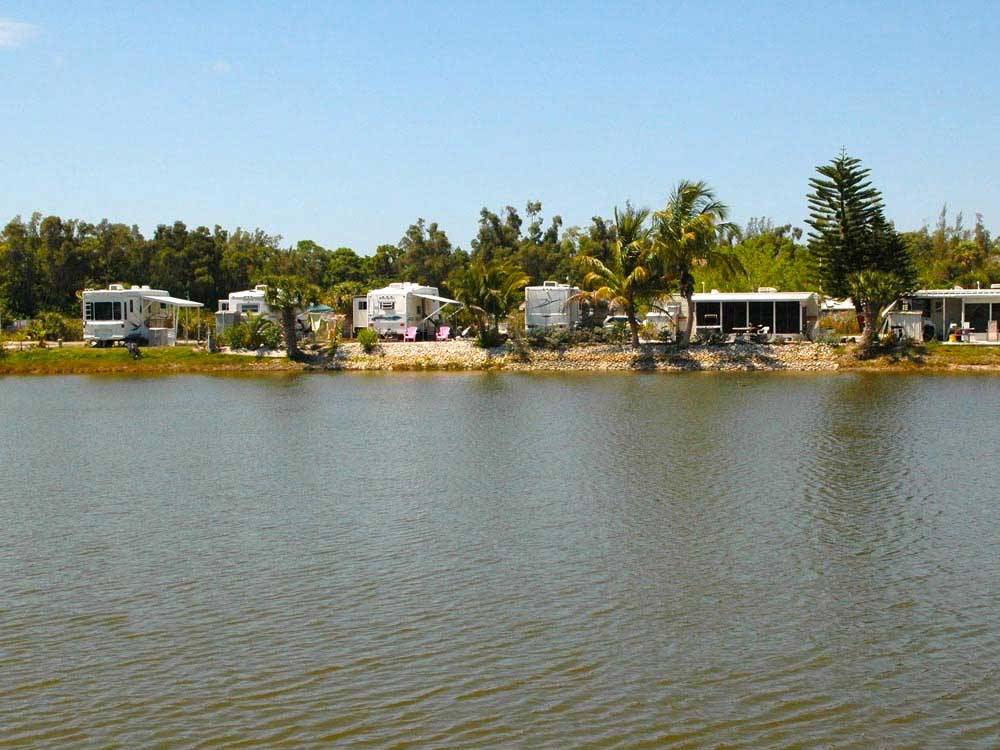Trailers camping on the water at FORT MYERS/PINE ISLAND KOA HOLIDAY