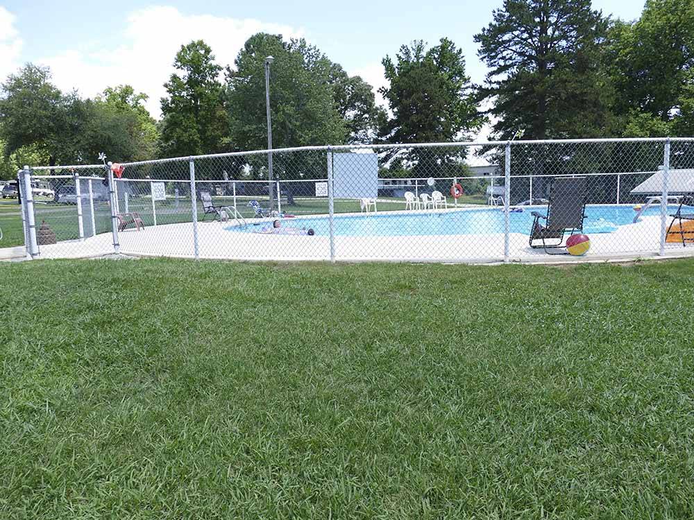 The fenced in swimming pool at CUNNINGHAM RV PARK