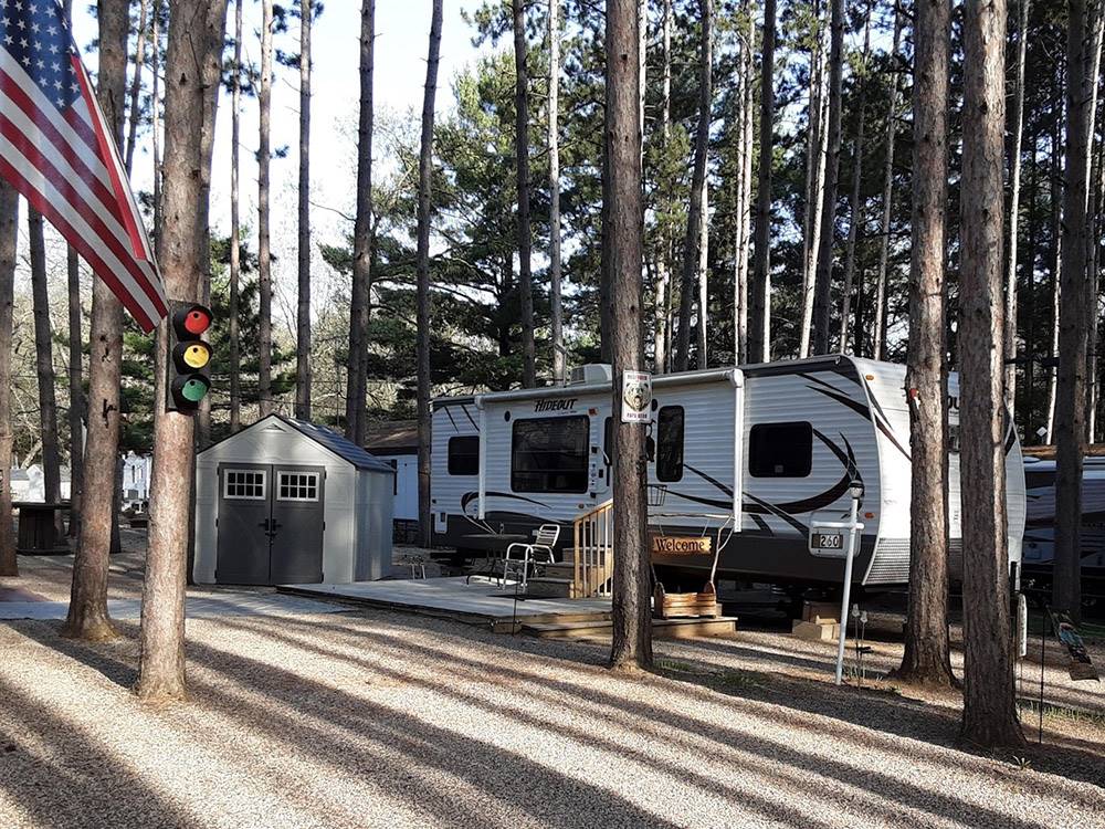 Fifth wheel trailer with a deck at PEARL LAKE RV CAMPGROUND BY RJOURNEY