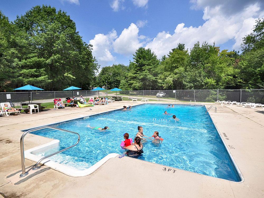 Guest enjoying the swimming pool at PROSPECT MOUNTAIN CAMPGROUND