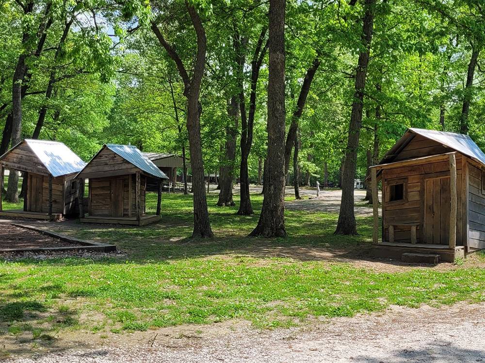 A view of the smaller cabins at PERRYVILLE RV RESORT BY RJOURNEY