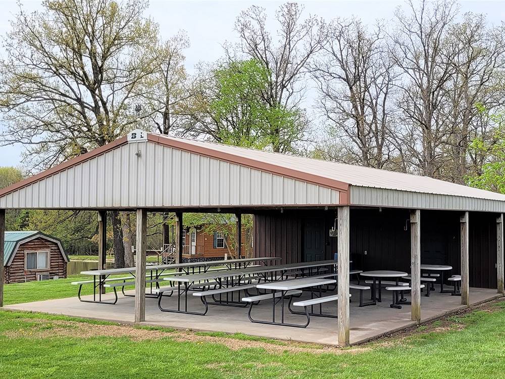 The pavilion with picnic benches at PERRYVILLE RV RESORT BY RJOURNEY