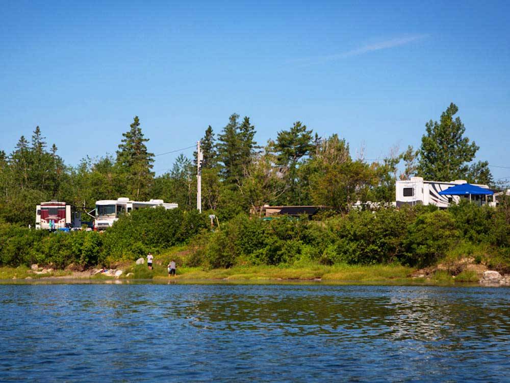 RVs and trailers camping on the water at NARROWS TOO CAMPING RESORT