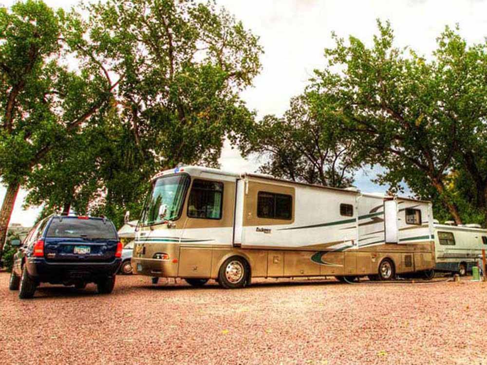 RVs and trailers at campground at GOLDFIELD RV PARK