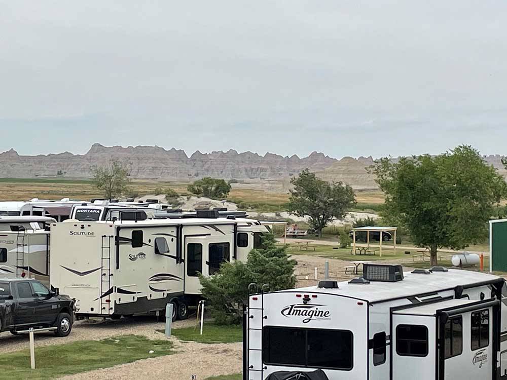 RVs parked on-site at BADLANDS MOTEL & CAMPGROUND