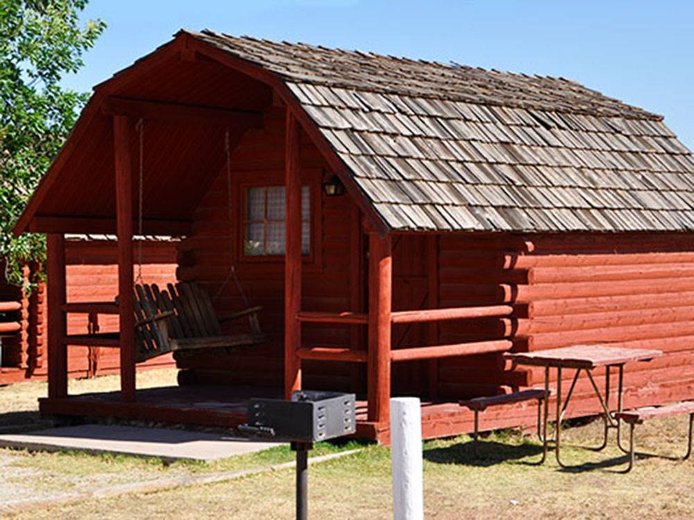 One of the log cabin rentals at VAN HORN RV PARK
