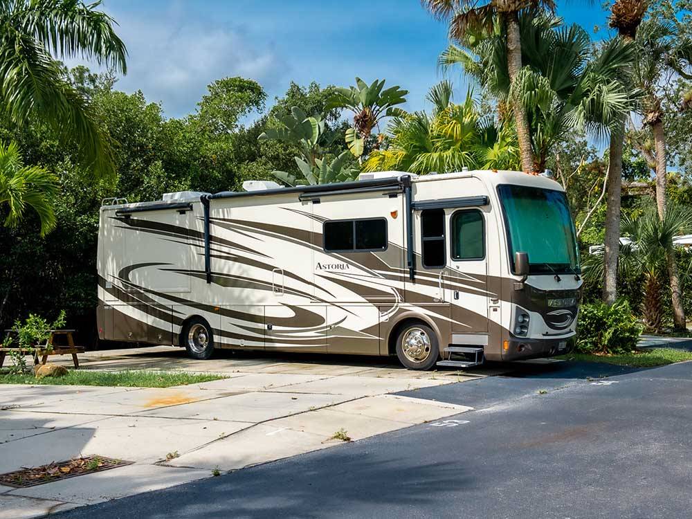 Class A motorhome parked onsite at NORTHTIDE NAPLES RV RESORT