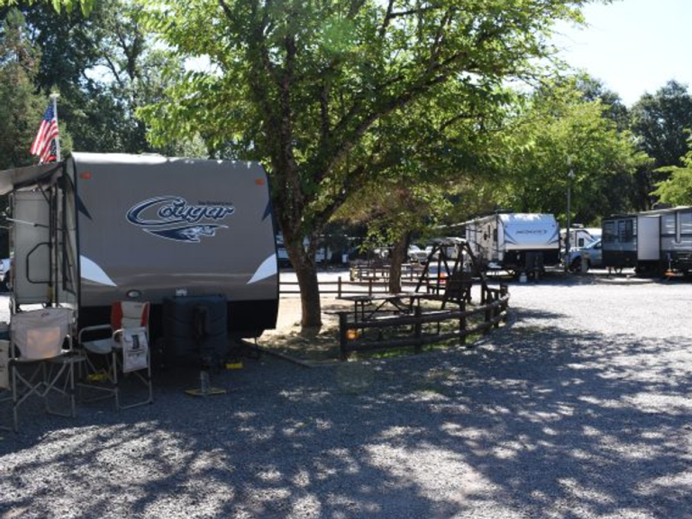 Trailer in gravel site at Mendocino Redwoods RV Resort